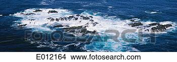 Stock Photo - ocean waves crashing 
on rocks. fotosearch 
- search stock 
photos, pictures, 
images, and photo 
clipart
