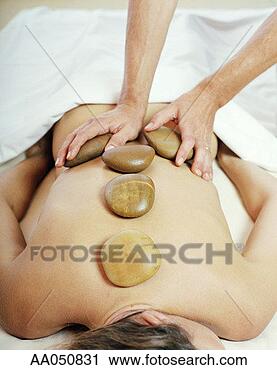 Stock Photography - stone massage 
therapy. fotosearch 
- search stock 
photos, pictures, 
images, and photo 
clipart
