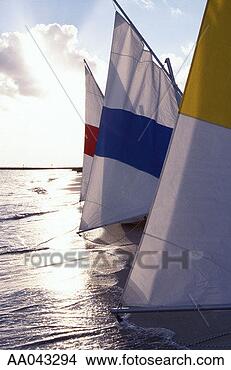 Stock Photo - sails on the beach. 
fotosearch - search 
stock photos, 
pictures, images, 
and photo clipart