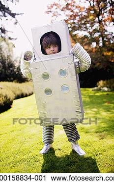 Stock Photography - boy (3-5) standing 
in yard, wearing 
robot costume. 
fotosearch - search 
stock photos, 
pictures, images, 
and photo clipart