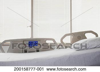 Stock Photography - empty hospital 
bed. fotosearch 
- search stock 
photos, pictures, 
images, and photo 
clipart