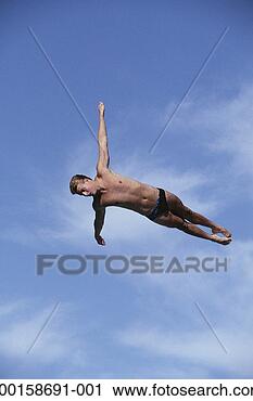 Stock Photography - male diver in 
mid-air (digital 
enhancement). 
fotosearch - search 
stock photos, 
pictures, images, 
and photo clipart