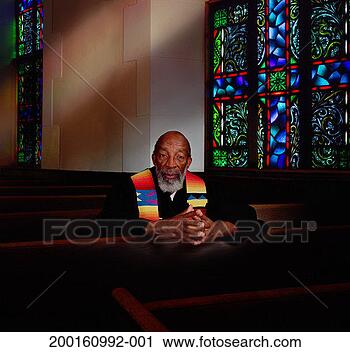 Stock Photography - reverand sitting 
in chuch pew, 
portrait. fotosearch 
- search stock 
photos, pictures, 
images, and photo 
clipart
