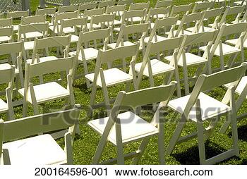 Stock Photography - rows of empty 
folding chairs 
on lawn, elevated 
view. fotosearch 
- search stock 
photos, pictures, 
images, and photo 
clipart