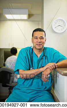 Stock Photography - mature medical 
staff member wearing 
scrubs, portrait. 
fotosearch - search 
stock photos, 
pictures, images, 
and photo clipart
