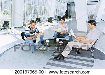 Stock Photography - three men at table 
in office lobby, 
reading newspapers. 
fotosearch - search 
stock photos, 
pictures, images, 
and photo clipart