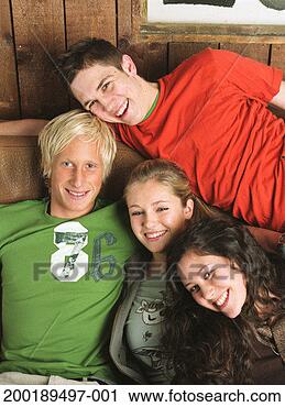Stock Photography - three teenagers 
(16-18) and young 
man, portrait, 
smiling. fotosearch 
- search stock 
photos, pictures, 
images, and photo 
clipart