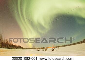 Stock Photography - usa, alaska, aurora 
borealis over 
snow-covered landscape, 
night. fotosearch 
- search stock 
photos, pictures, 
images, and photo 
clipart