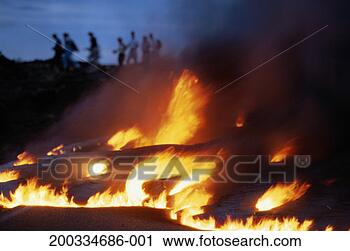 Stock Photography - usa, hawaii, big 
island, volcanoes 
np, burning lava 
near tourists. 
fotosearch - search 
stock photos, 
pictures, images, 
and photo clipart