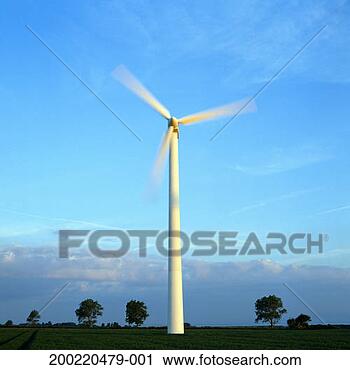 Stock Photography - wind turbine in 
field (blurred 
motion). fotosearch 
- search stock 
photos, pictures, 
images, and photo 
clipart
