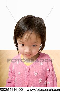 Stock Photography - girl (2-4) looking 
down. fotosearch 
- search stock 
photos, pictures, 
images, and photo 
clipart