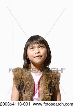 Stock Photography - girl (6-8) looking 
up. fotosearch 
- search stock 
photos, pictures, 
images, and photo 
clipart