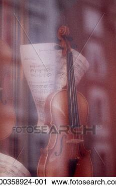 Stock Photography - violin on display 
in shop window 
(soft focus). 
fotosearch - search 
stock photos, 
pictures, images, 
and photo clipart