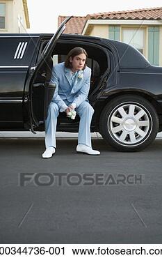 Stock Photography - young man in tuxedo 
sitting in limousine 
with door open, 
portrait. fotosearch 
- search stock 
photos, pictures, 
images, and photo 
clipart