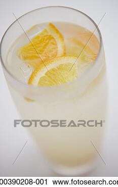 Stock Photography - beverage in glass 
with ice and orange 
wedges, elevated 
view. fotosearch 
- search stock 
photos, pictures, 
images, and photo 
clipart