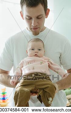 Stock Photography - father holding 
baby girl (0-3 
months). fotosearch 
- search stock 
photos, pictures, 
images, and photo 
clipart