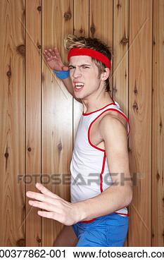 Stock Photography - young man practicing 
martial arts, 
side view, portrait. 
fotosearch - search 
stock photos, 
pictures, images, 
and photo clipart