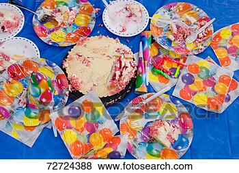 Stock Photo - aftermath of birthday 
party, elevated 
view. fotosearch 
- search stock 
photos, pictures, 
images, and photo 
clipart