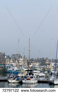 Stock Photo - boats moored in 
small harbour. 
fotosearch - search 
stock photos, 
pictures, images, 
and photo clipart