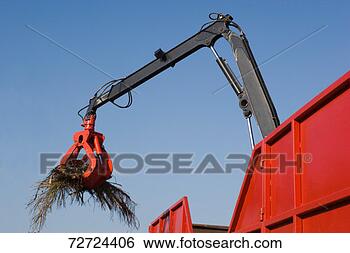 Stock Photo - dump truck with 
crane picking 
up trash. fotosearch 
- search stock 
photos, pictures, 
images, and photo 
clipart
