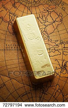 Stock Photo - gold ingot on 
world map. fotosearch 
- search stock 
photos, pictures, 
images, and photo 
clipart