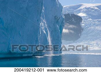 Stock Photography - antarctica, neko 
harbor, waterfall 
in iceberg. fotosearch 
- search stock 
photos, pictures, 
images, and photo 
clipart
