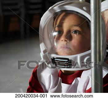 Stock Photography - boy (5-7) wearing 
spaceman costume, 
close-up. fotosearch 
- search stock 
photos, pictures, 
images, and photo 
clipart