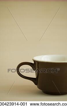 Stock Photography - brown enameled 
coffee cup. fotosearch 
- search stock 
photos, pictures, 
images, and photo 
clipart