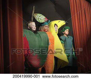 Stock Photography - children (4-6) 
on stage wearing 
fruit and vegetable 
costumes, close-up. 
fotosearch - search 
stock photos, 
pictures, images, 
and photo clipart