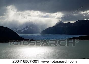 Stock Photography - fitz roy and poincenot 
in morning mist. 
fotosearch - search 
stock photos, 
pictures, images, 
and photo clipart