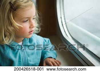 Stock Photography - girl (2-4) looking 
out ferry window. 
fotosearch - search 
stock photos, 
pictures, images, 
and photo clipart