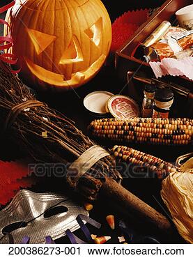 Stock Photography - jack-o-lantern, 
witch's broom, 
dried maize, mask 
and make-up. fotosearch 
- search stock 
photos, pictures, 
images, and photo 
clipart