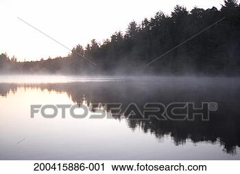 Stock Photography - mist over lake. 
fotosearch - search 
stock photos, 
pictures, images, 
and photo clipart