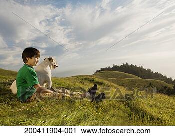 Stock Photography - usa, california, 
mt tamalpais, 
boy (9-11) and 
bulldog on hillside. 
fotosearch - search 
stock photos, 
pictures, images, 
and photo clipart