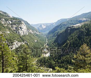 Stock Photography - usa, california, 
yosemite np, valley 
in mountainous 
landscape. fotosearch 
- search stock 
photos, pictures, 
images, and photo 
clipart