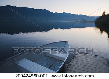 Stock Photography - usa, washington, 
olympic peninsula, 
quinualt lake, 
boat on pier. 
fotosearch - search 
stock photos, 
pictures, images, 
and photo clipart