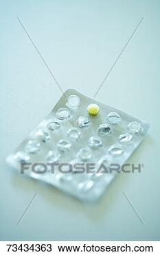 Stock Photo - blister pack with 
one yellow pill 
remaining, close-up. 
fotosearch - search 
stock photos, 
pictures, images, 
and photo clipart