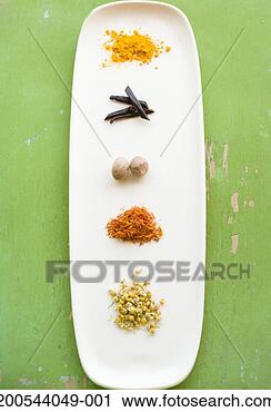 Stock Photography - assorted herbs 
and spices on 
serving tray, 
overhead view. 
fotosearch - search 
stock photos, 
pictures, images, 
and photo clipart