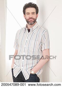Stock Photography - businessman against 
white background, 
portrait. fotosearch 
- search stock 
photos, pictures, 
images, and photo 
clipart