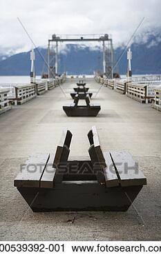 Stock Photography - canada, british 
columbia, howe 
sound, row of 
benches on pier. 
fotosearch - search 
stock photos, 
pictures, images, 
and photo clipart