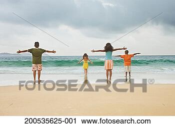 Stock Photography - children (6-12) 
playing on beach, 
rear view. fotosearch 
- search stock 
photos, pictures, 
images, and photo 
clipart