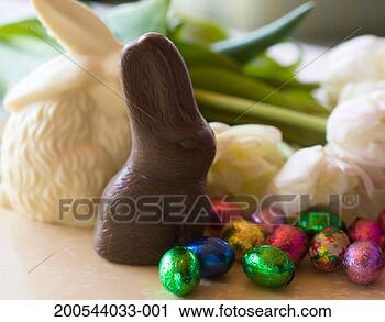 Stock Photography - chocolate bunnies 
and chocolate 
eggs wrapped in 
foil. fotosearch 
- search stock 
photos, pictures, 
images, and photo 
clipart