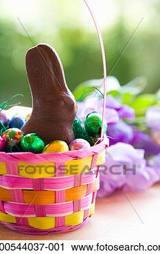 Stock Photography - chocolate bunny 
and chocolate 
eggs in easter 
basket. fotosearch 
- search stock 
photos, pictures, 
images, and photo 
clipart