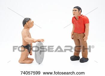 Stock Photograph - clay model of 
caveman with stone 
wheel looking 
at modern man, 
 on. fotosearch 
- search stock 
photos, pictures, 
images, and photo 
clipart