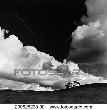 Stock Photography - clouds over valley 
in rural landscape 
(b&w). fotosearch 
- search stock 
photos, pictures, 
images, and photo 
clipart