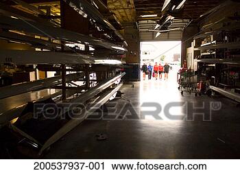 Stock Photography - five mature women 
entering boathouse 
filled with sculls. 
fotosearch - search 
stock photos, 
pictures, images, 
and photo clipart