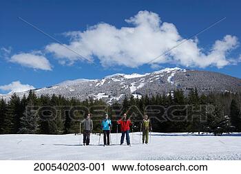 Stock Photography - four adults cross-country 
skiing. fotosearch 
- search stock 
photos, pictures, 
images, and photo 
clipart
