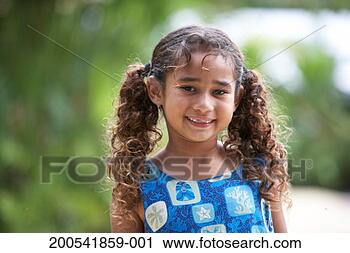 Stock Photography - girl (5-7) with 
pigtails smiling, 
portrait. fotosearch 
- search stock 
photos, pictures, 
images, and photo 
clipart