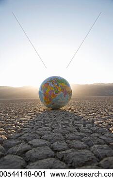 Stock Photography - globe on cracked 
earth. fotosearch 
- search stock 
photos, pictures, 
images, and photo 
clipart