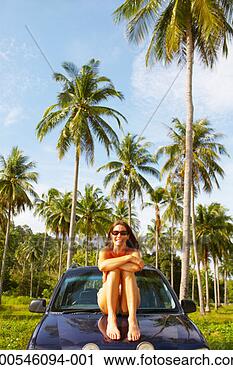 Stock Photography - malaysia, pulau 
langkawi woman 
sitting on jeep 
bonnet, portrait. 
fotosearch - search 
stock photos, 
pictures, images, 
and photo clipart